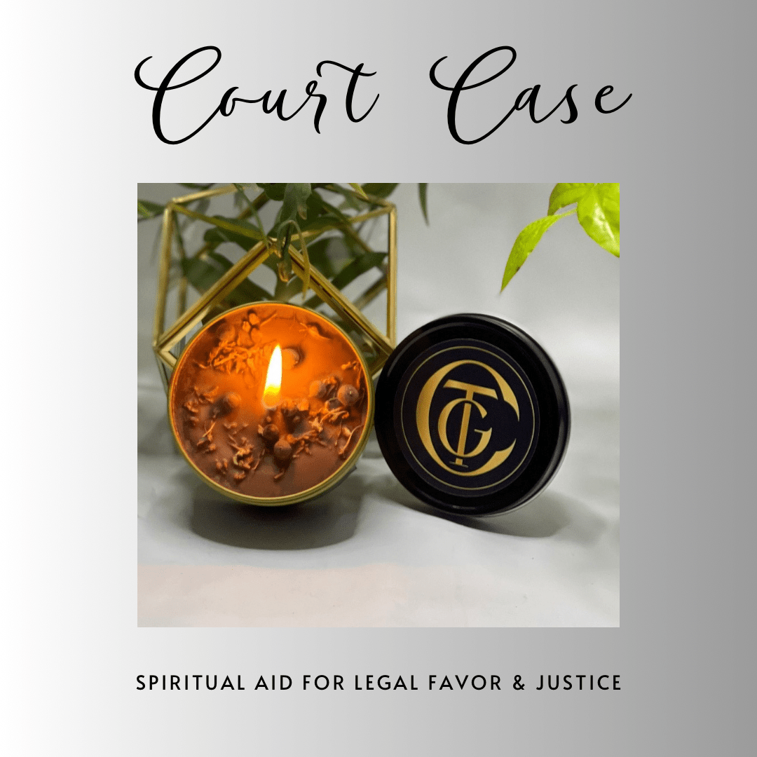 Candle in a metallic holder with a black lid featuring a logo, on a light background.