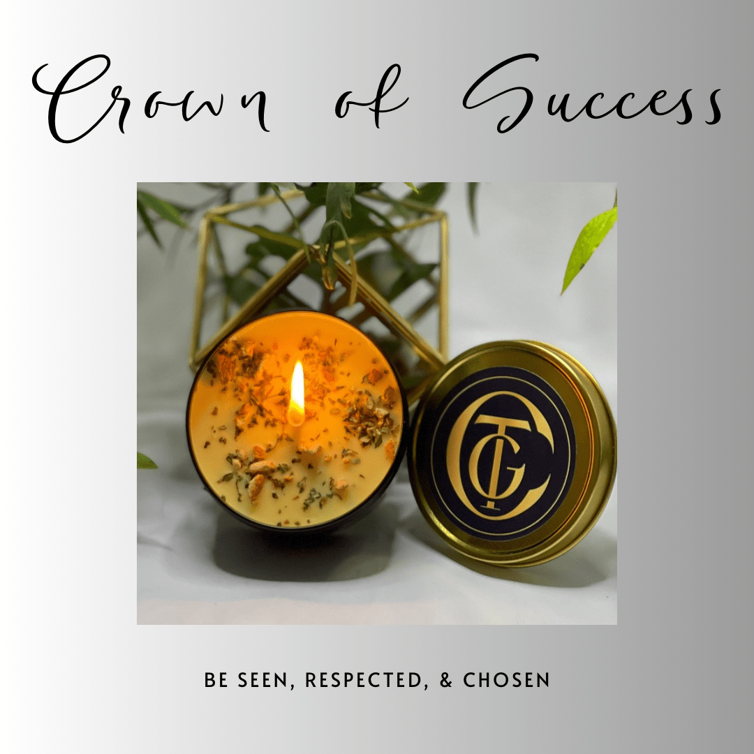 Candle with decorative lid labeled 'Crown of Success' on a light background