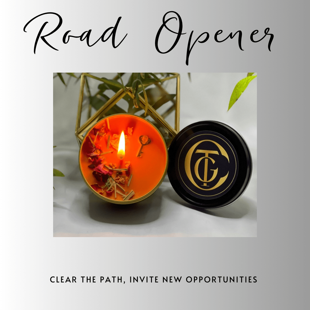 Candle with decorative elements and a black container on a light background, featuring the brand 'TC'.