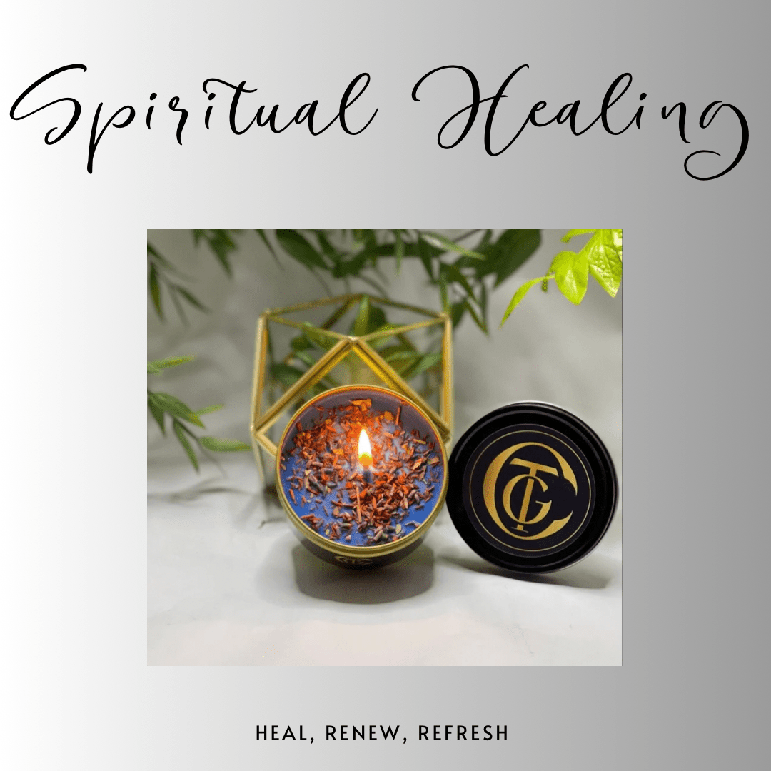 Candle in a geometric holder with a brand logo, surrounded by green leaves, on a light background.