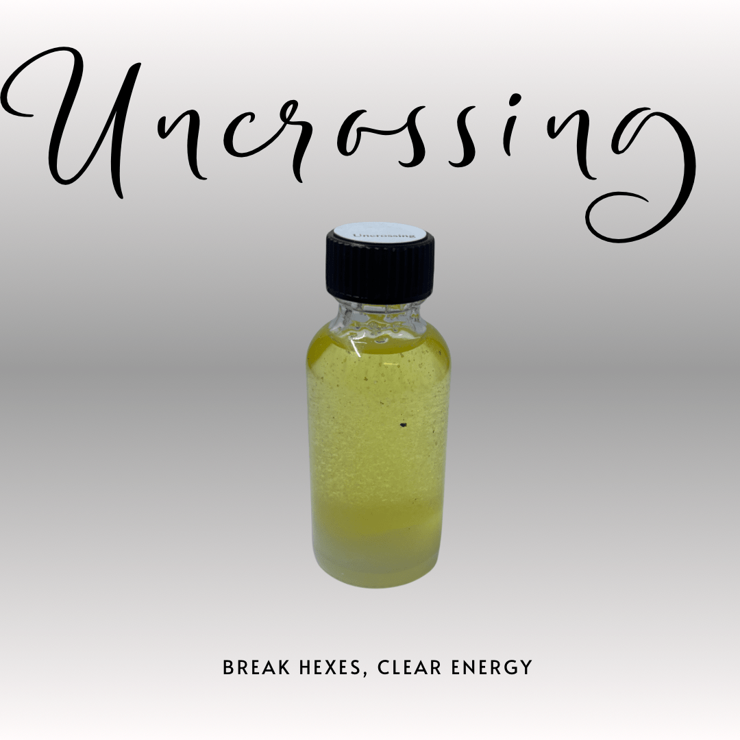 Bottle of yellow liquid with a black cap on a white background, featuring the word 'Uncrossing'.